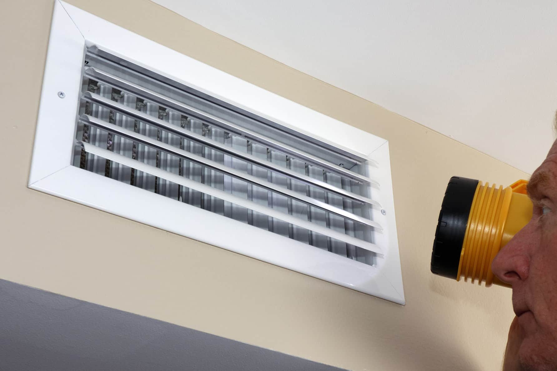 Inspecting the vents, Energy Recovery Ventilators.